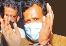 நீதிமன்றில் நுழைந்து ரிஸாட்டிற்கு அருகே இருந்த மர்மநபர் யார்?